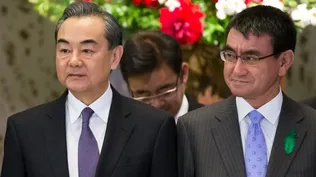 Los ministros de relaciones exteriores de China, Wang Yi y de Japón, Taro Kono