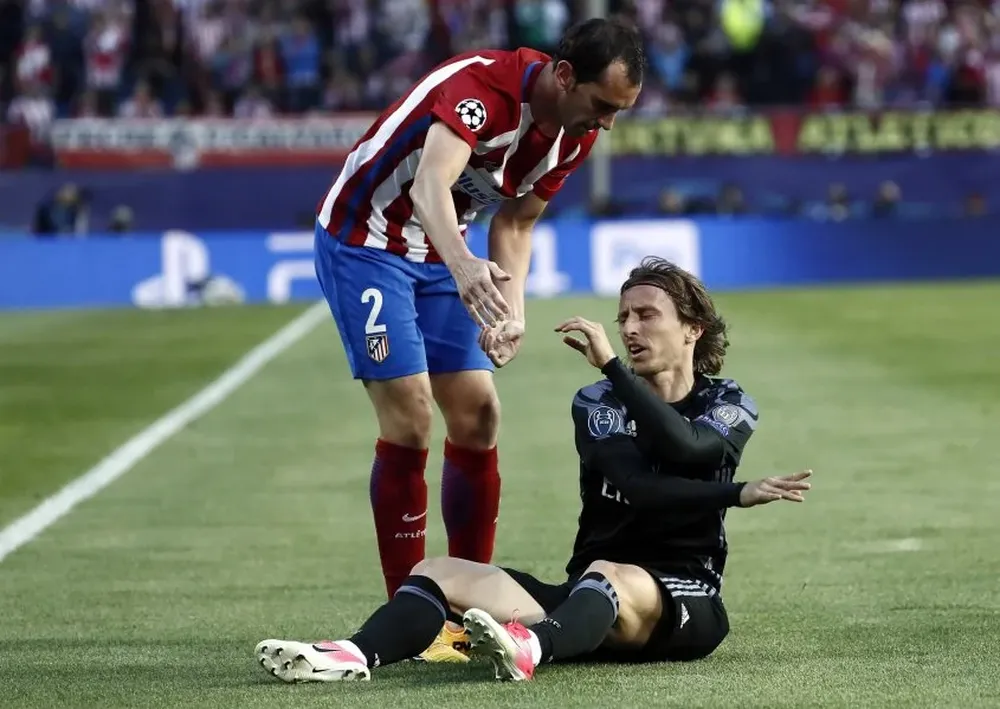 Diego Godín y Luka Modric