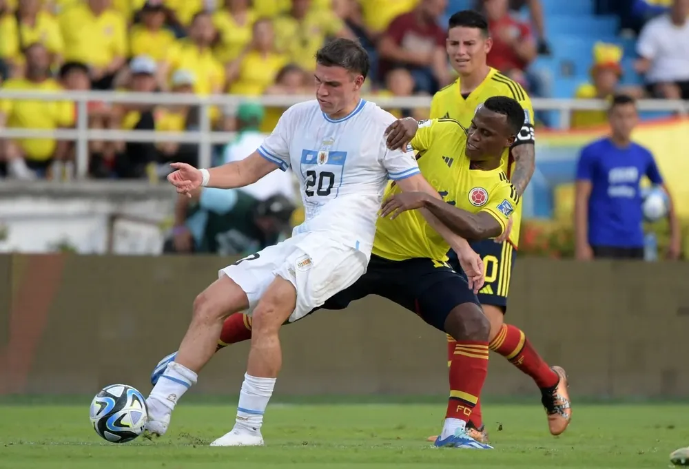 Manuel Ugarte y Jhon Arias