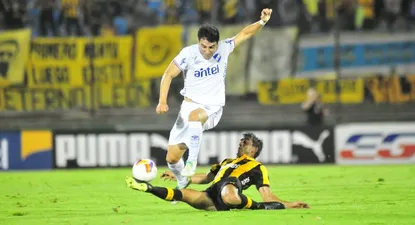 Jorge Fucile y Diego Ifrán