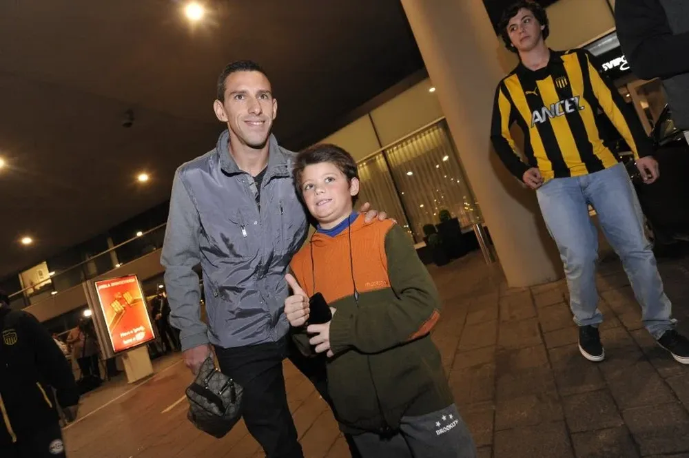 Maxi, una foto, le pidió el niño al volante rosarino.
