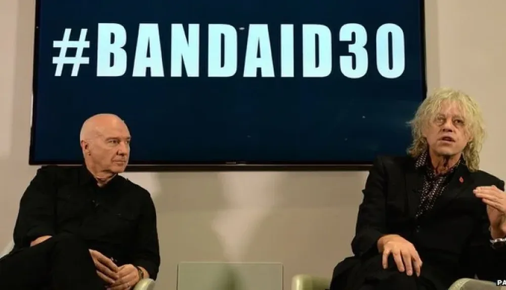 Midge Ure y Bob Geldof en conferencia