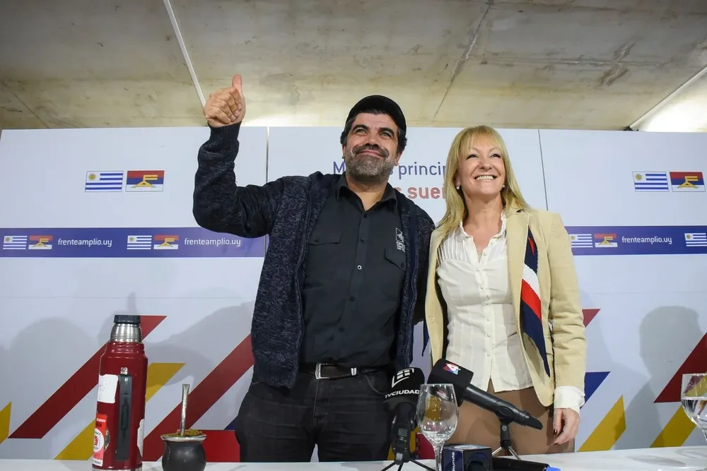 Óscar Andrade y Carolina Cosse