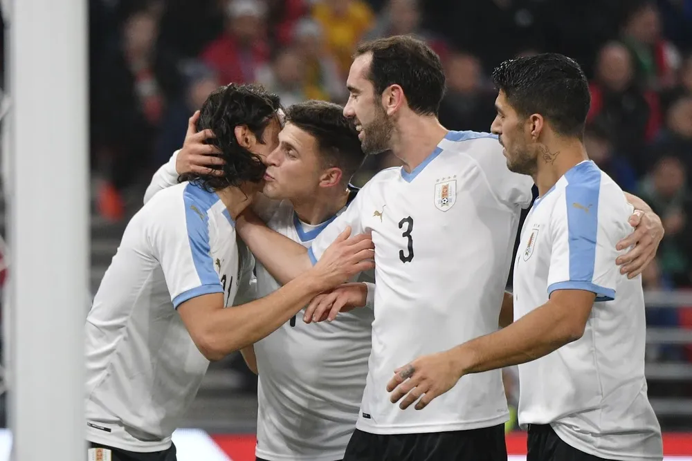 Cavani, Godín y Suárez con la selección