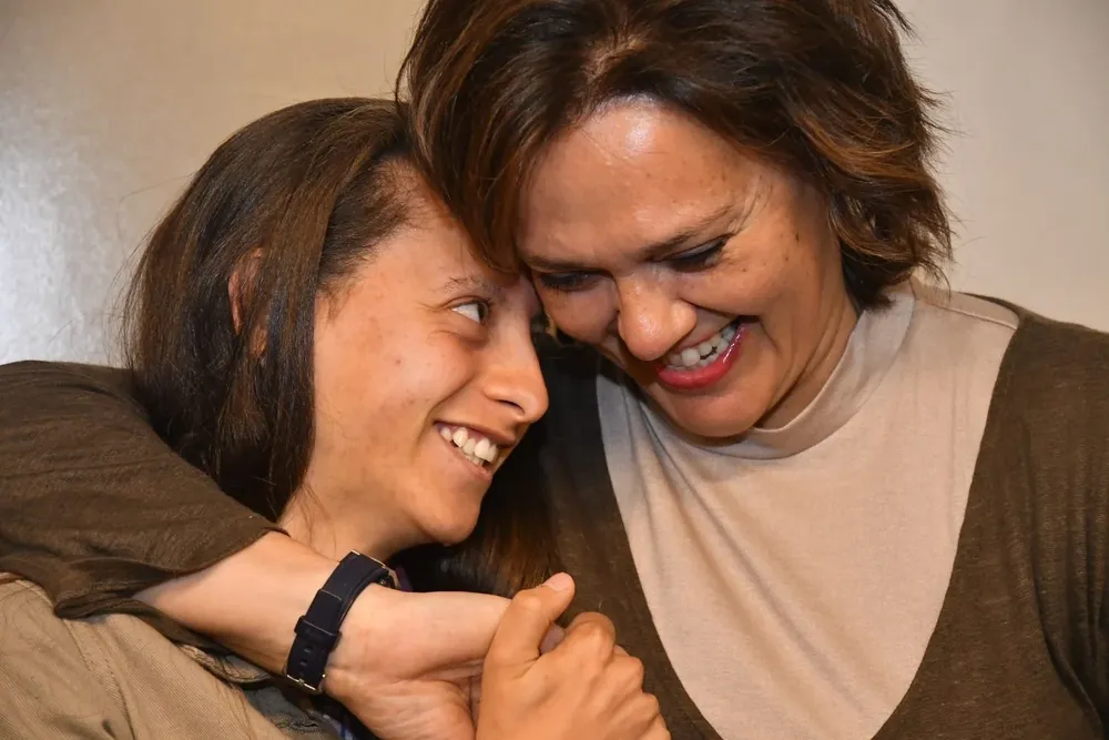 Aquino y Mariana Fernández, presidenta del fútbol femenino de AUF