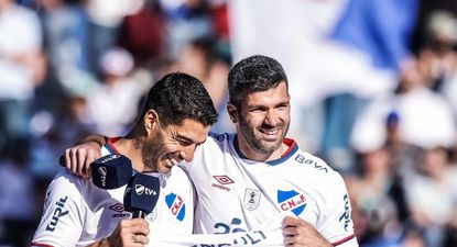 Emmanuel Gigliotti y Luis Suárez