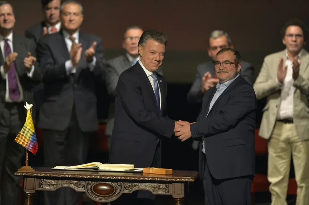 Juan Manuel Santos y Timochenko