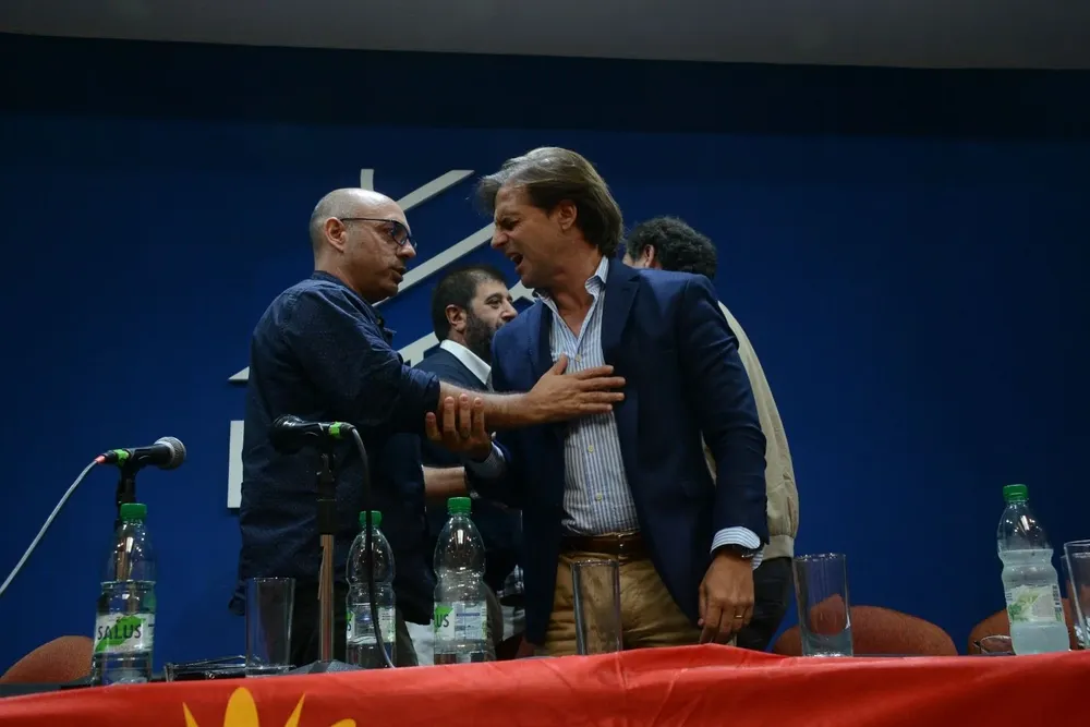 Marcelo Abdala y Luis Lacalle Pou en la sede del PIT-CNT