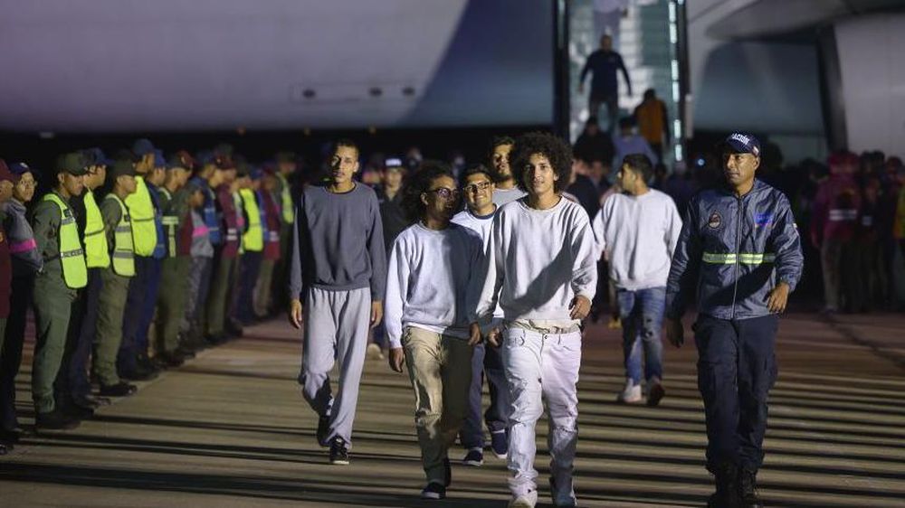Venezolanos de regreso a Caracas el pasado marzo en un vuelo de deportación.