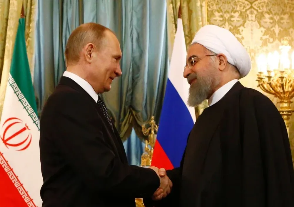 Vladimir Putin con el presidente iraní, Hassan Rouhani.