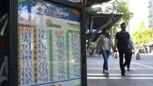 Tabla de la Quiniela y la Tómbola en un local comercial. (Archivo)