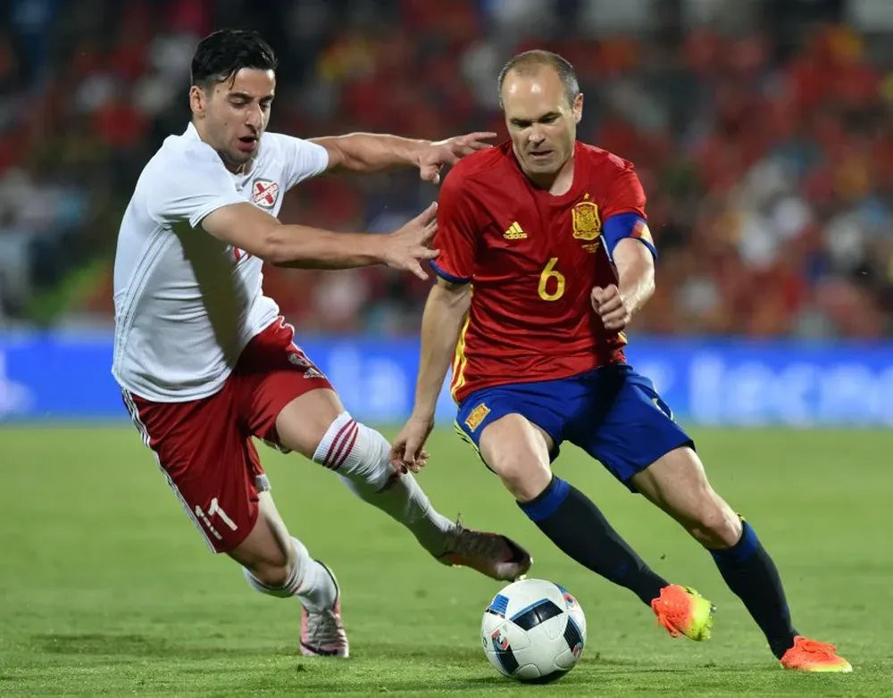 Giorgi Chanturia y Andrés Iniesta