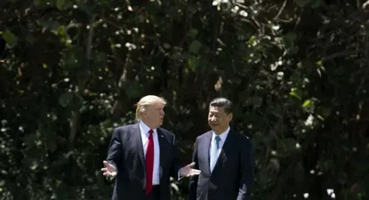 El presidente de Estados Unidos, Donald Trump, junto a su homólogo de China Xi Jinping