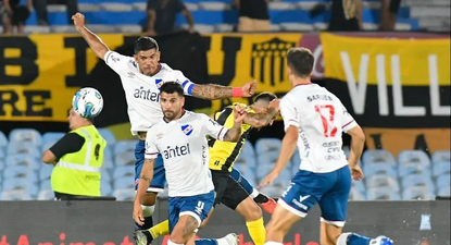 Diego Polenta y Gabriel Báez de Nacional ante Peñarol