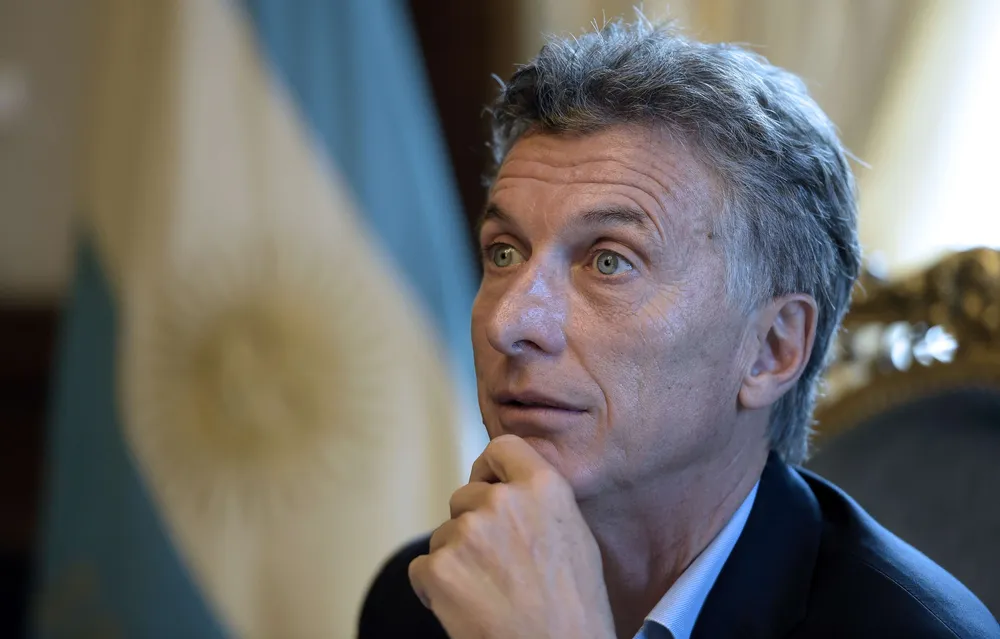Argentinas President Mauricio Macri offers an interview to AFP at the Casa Rosada presidential palace in Buenos Aires on February 22, 2016. Macri won elections in November 2015, ending 12 years of leftist and crisis-ridden rule by the late Nestor Kirchner and his wife Cristina. US President Barack Obama will travel to Argentina next month, offering support to Macris efforts to end a decade-and-a-half of financial isolation and political enmity with Washington. Macri signaled that hed like to have closer economic and diplomatic cooperation with the United States, said top Obama foreign policy aide Ben Rhodes, announcing Obamas visit.  AFP PHOTO / JUAN MABROMATA