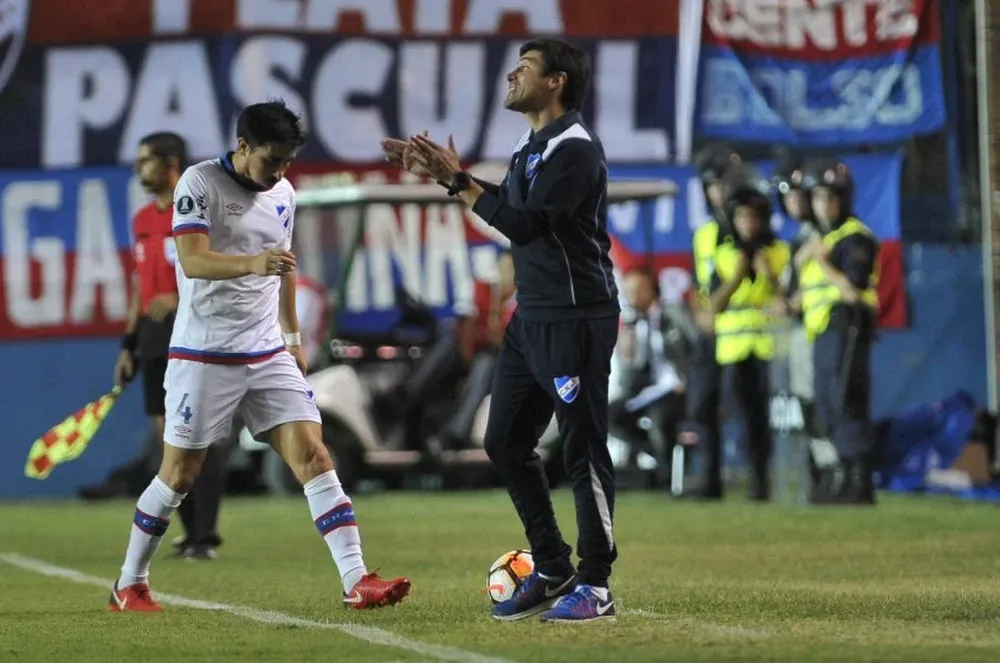 Jorge Fucile y Alexander Medina