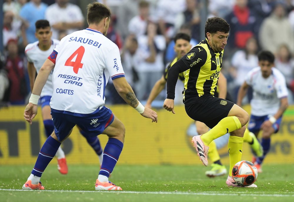 Sebastián Coates y Matías Arezo