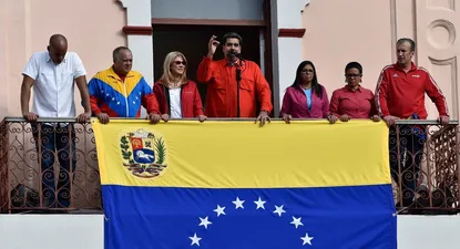 El presidente de Venezuela, Nicolás Maduro, junto a Diosdado Cabello y Delcy Rodríguez en el balcón del Palacio de Miraflores este miércoles