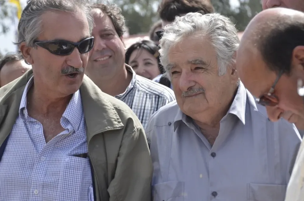 Stirling habla del sector arrocero, el presidente Mujica y el productor Fernando Giménez escuchan