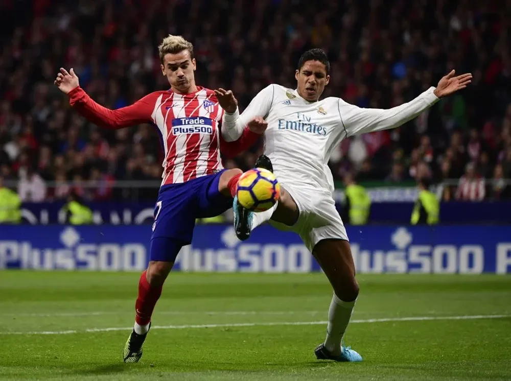 Antoine Griezmann y Raphael Varane
