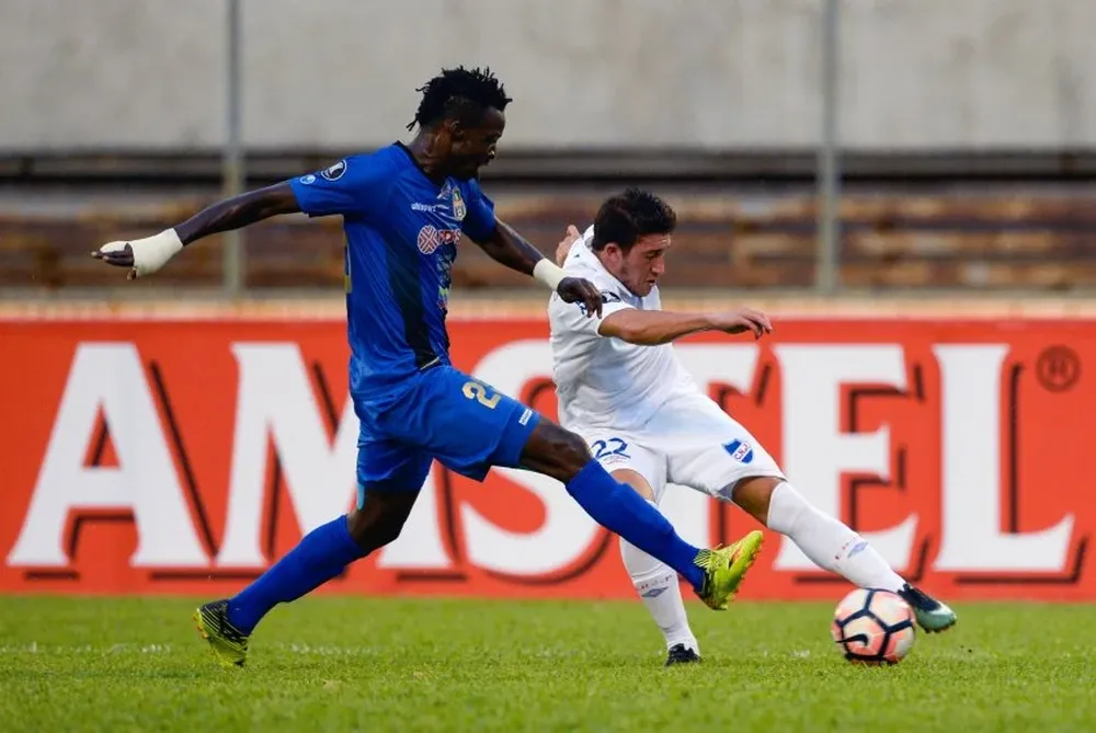 Herve Kambou y Alfonso Espino