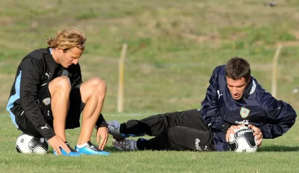 Diego Forlán y Andrés Scotti en la selección