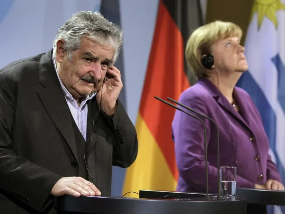 Mujica con Merkel