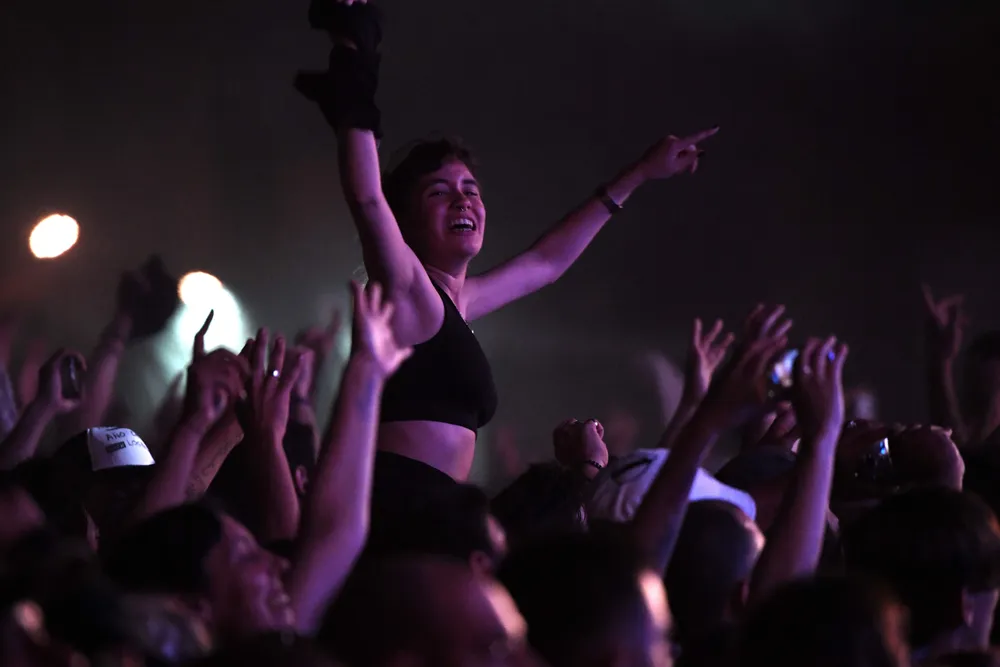 Uruguays Peyote Asesino lead singer Fernando Santullo performs during the Montevideo Rock music festival in Montevideo, on December 2, 2017.  / AFP / PABLO PORCIUNCULA
