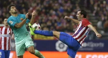 Luis Suárez y Diego Godín