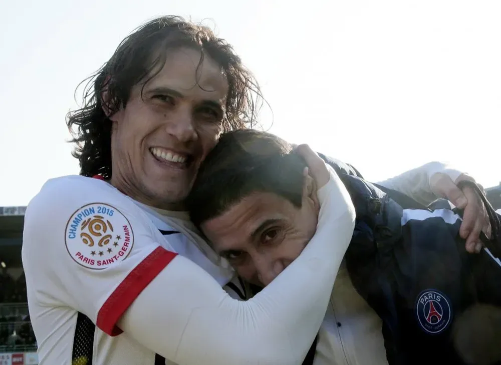 Cavani celebra con Di María el título conseguido con PSG