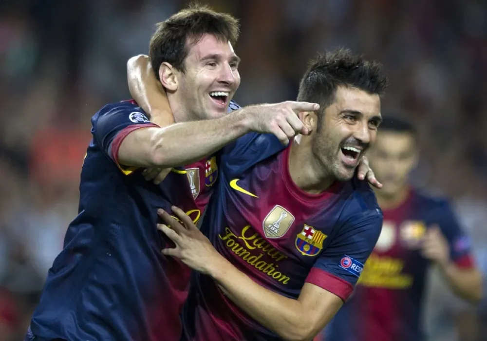 Lionel Messi y David Villa