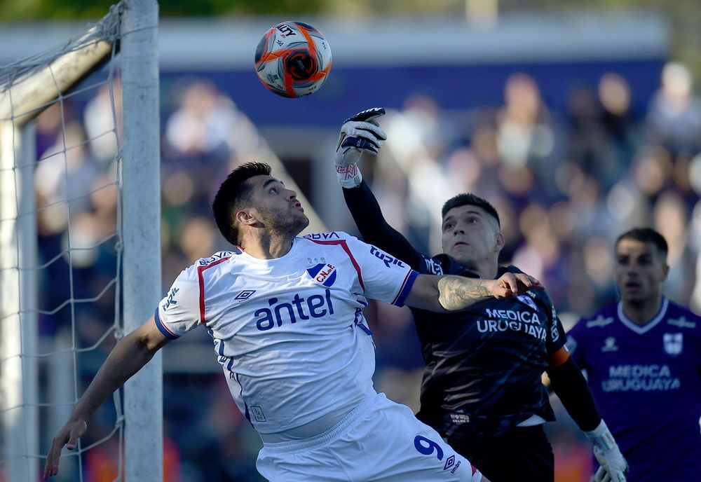 Maximiliano Gómez y Kevin Dawson