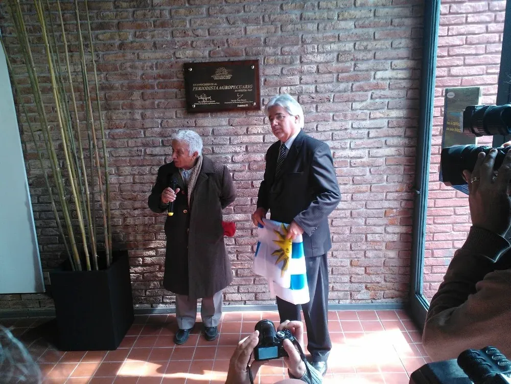 El periodista agropecuario Bimbo Rodríguez y el ministro Tabaré Aguerre
