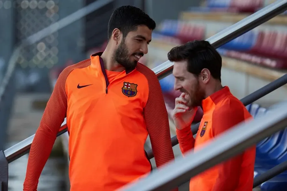 Suárez y Messi en la previa del partido ante Roma