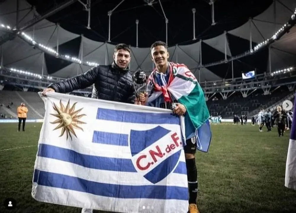 Renzo Sánchez y Rodrigo Chagas con la copa en La Plata