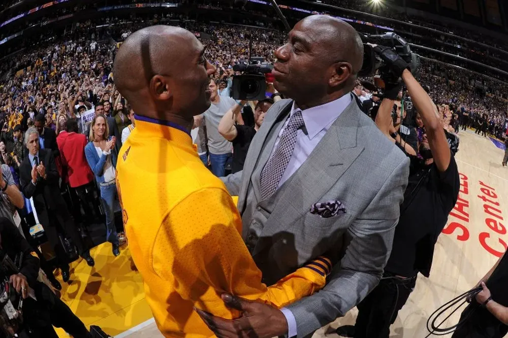 Kobe Bryant y Magic Johnson Kobe Bryant y Magic Johnson