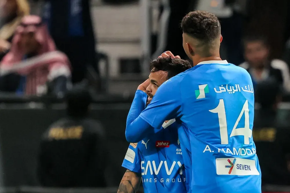 El festejo de Michael con Abdullah al-Hamdan