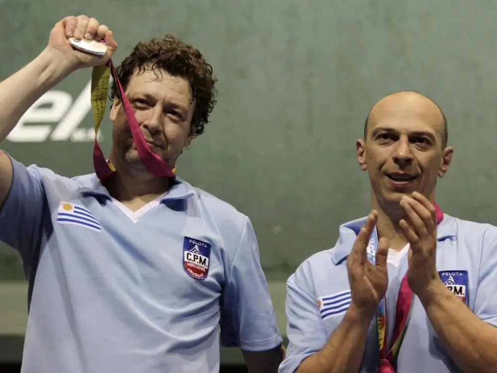 Buzzo y Cazzola con sus medallas