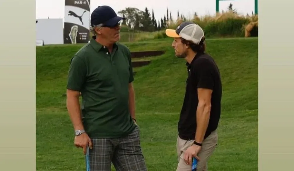 Laurent Blanc y Diego Forlán