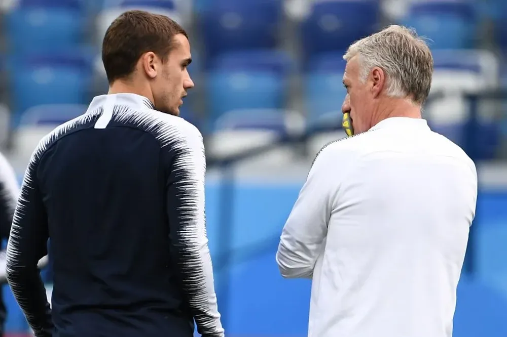 Griezmann y Deschamps