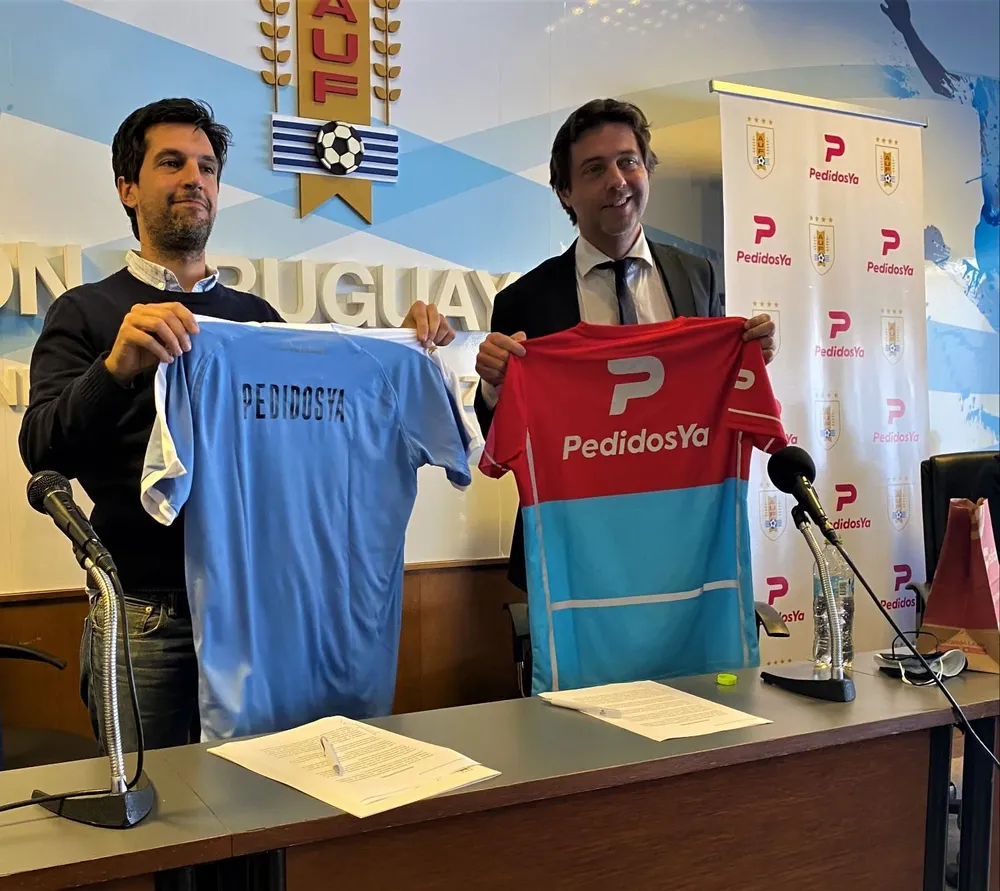 Felipe Álvarez, Managing Director de PedidosYa Uruguay e Ignacio Alonso, presidente de la AUF