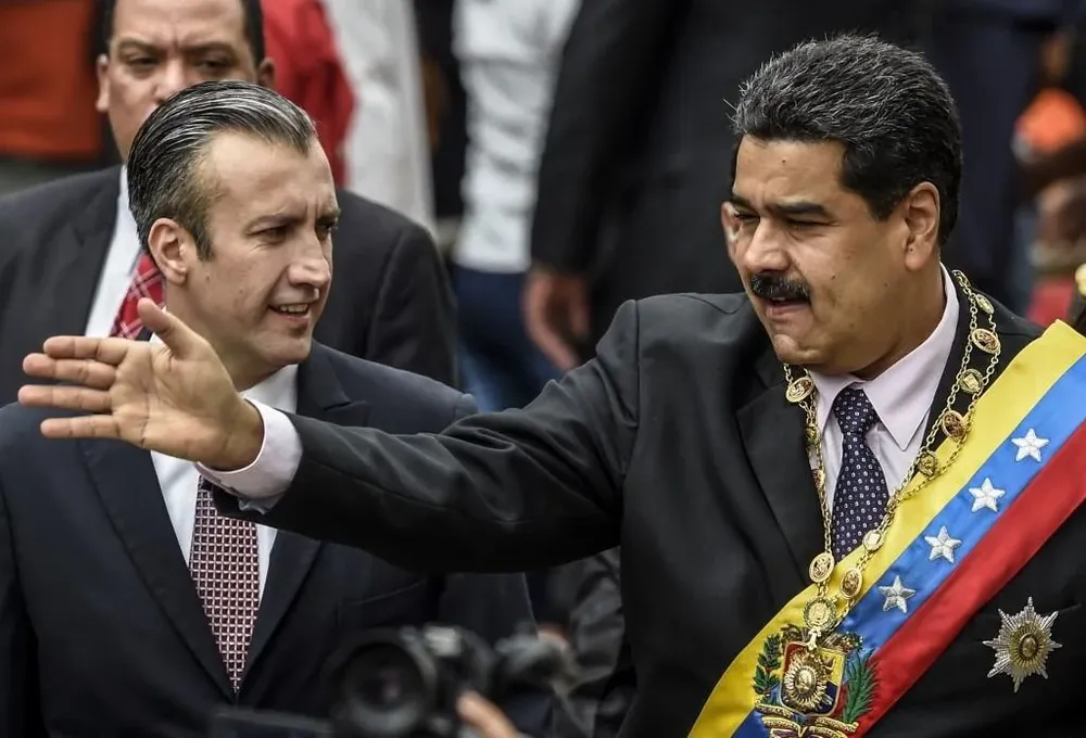 Tareck El Aissami y Micolás Maduro