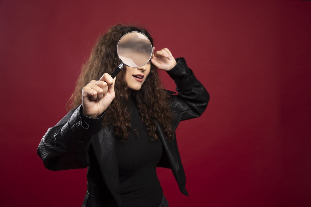 portrait-beautiful-woman-looking-through-magnifying-glass.jpg