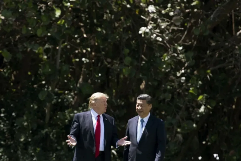 El presidente de Estados Unidos, Donald Trump, junto a su homólogo de China Xi Jinping