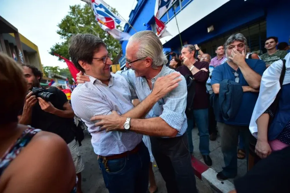 El presidente del FA, Javier Miranda, y el secretario general del Partido Comunista, Eduardo Lorier