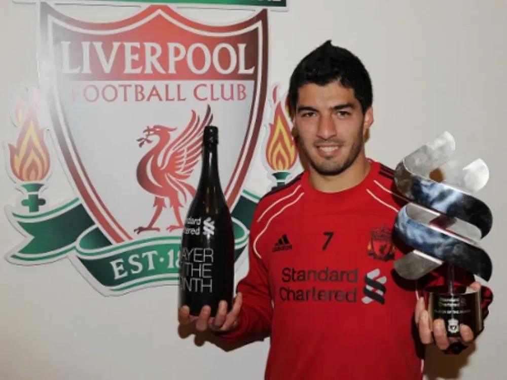 Suárez con los trofeos