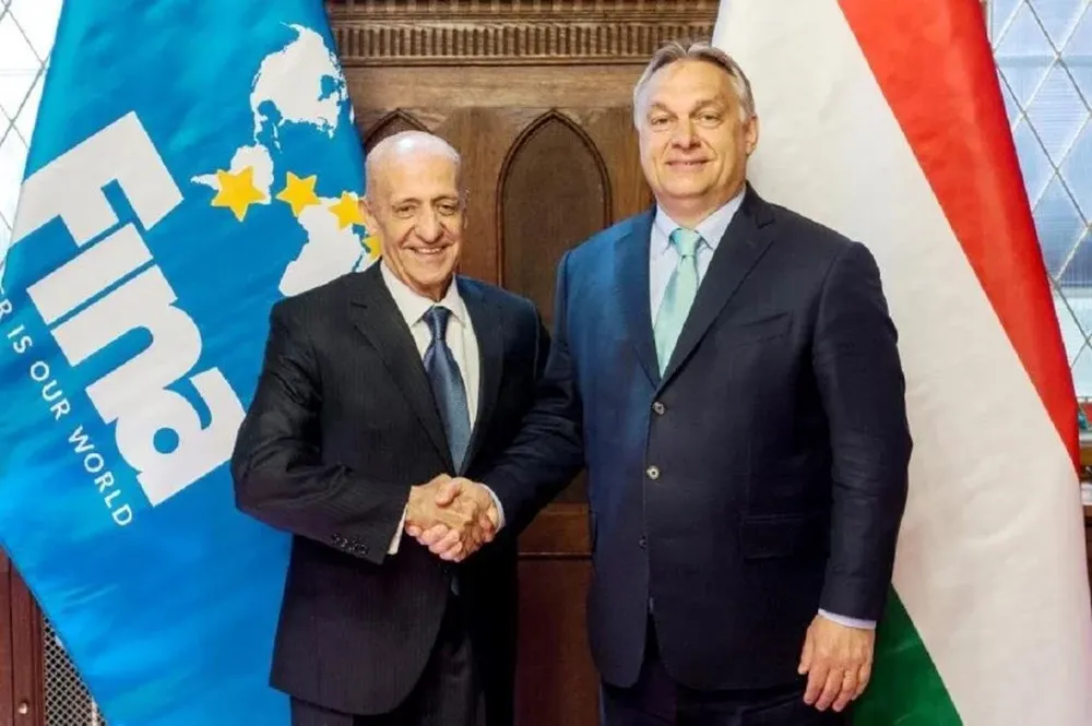 Julio César Maglione, presidente de FINA, y Viktor Orban, primer ministro de Hungría
