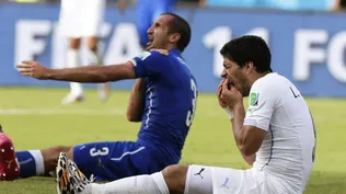 Chiellini y Suárez en el mundial de Brasil.