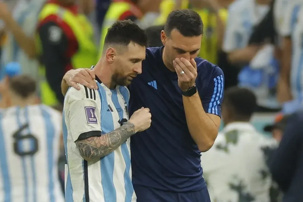 Lionel Messi y Scaloni