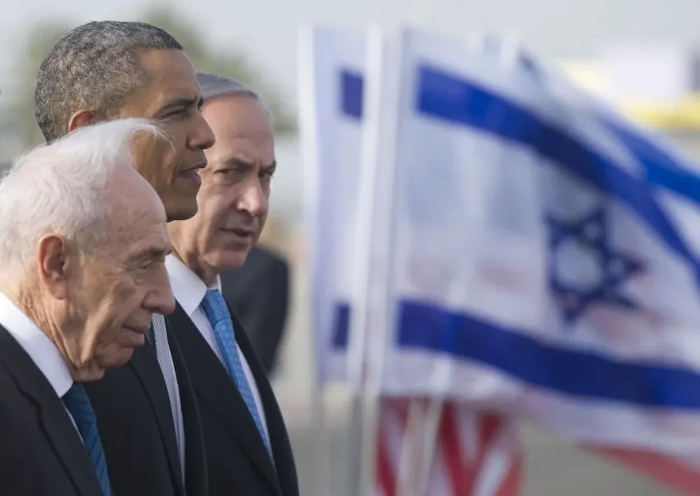 Shimon Peres en marzo de 2013 junto al presidente de Estados Unidos, Barack Obama, y el primer ministro de Israel, Benjamín Netanyahu
